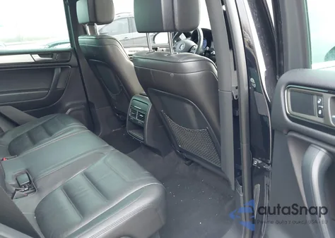 2014 Volkswagen Touareg 3.6L R-Line z USA, uszkodzony, nr VIN WVGDF9BP2ED002584